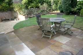 landscape gardeners Edinburgh - garden patio - hand cut paving circle